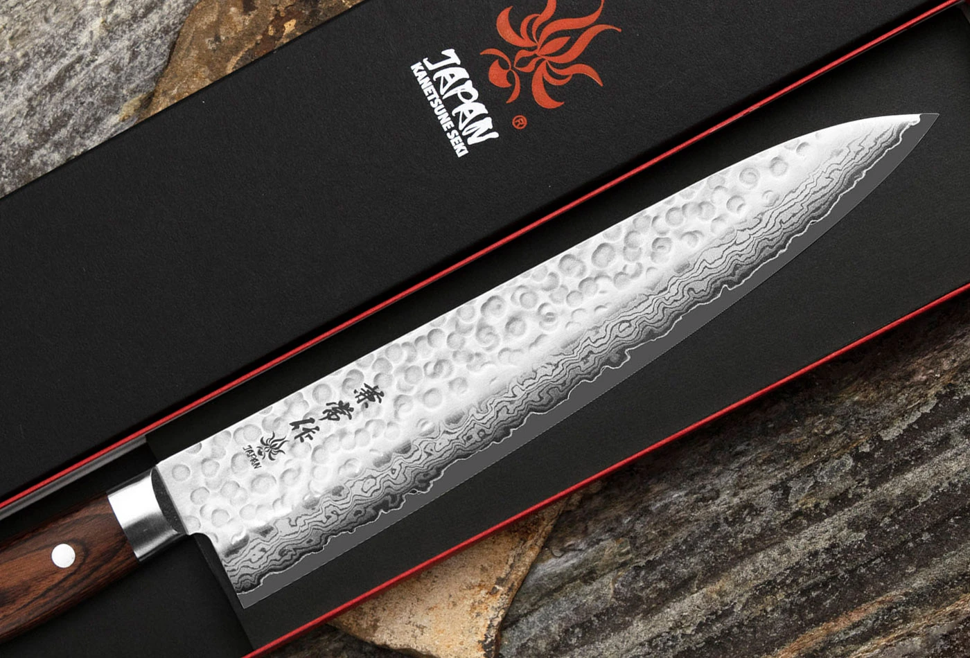Japoński nóż szefa kuchni Gyutoh 24 cm, stal VG-10, w eleganckim etui.
