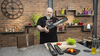 Japoński nóż Santoku Kasumi VG-10 PRO w eleganckim opakowaniu na tle kuchennym.