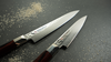 Nóż Santoku Mcusta Zanmai Supreme Hammered 18 cm na ciemnym tle