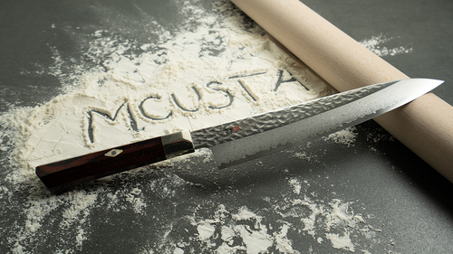 Santoku Mcusta Zanmai Supreme Hammered 18 cm na mące z wałkiem