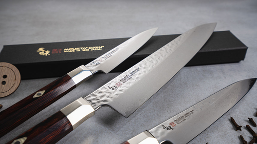 Gyutoh Mcusta Zanmai Supreme Hammered - damasceński nóż szefa kuchni, 24 cm.