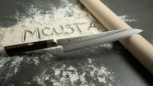 Nóż Mcusta Zanmai Supreme Hammered na mące z wałkiem