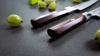Nóż Nakiri Mcusta Zanmai Supreme Hammered na tle agrestu