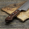Japoński nóż szefa kuchni Kanetsune Gyuto 24 cm z serii 900 na kamiennej desce