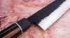Japoński nóż kucharza Suncraft Senzo Finest Gyuto 21 cm na tle marmuru