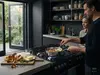 Atlantis Demeyere – stalowa patelnia sauté na kuchence w nowoczesnej kuchni.