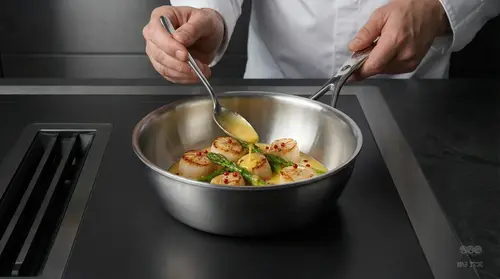 Patelnia sauté Demeyere Atlantis stalowa z pokrywką, Ø 22 cm, profesjonalna jakość.