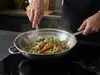 Stalowy wok Demeyere Specialities, 7-warstwowy, Ø 32 cm, z uchwytem