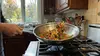 Stalowy wok Demeyere Specialities z uchwytem na kuchence gazowej