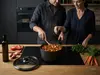 Scanpan Pro SB+ rondel tytanowo-ceramiczny z pokrywką w kuchni