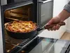 Eco Logic QXR Wood WOLL - głęboka patelnia tytanowa z drewnianym uchwytem, w piekarniku.
